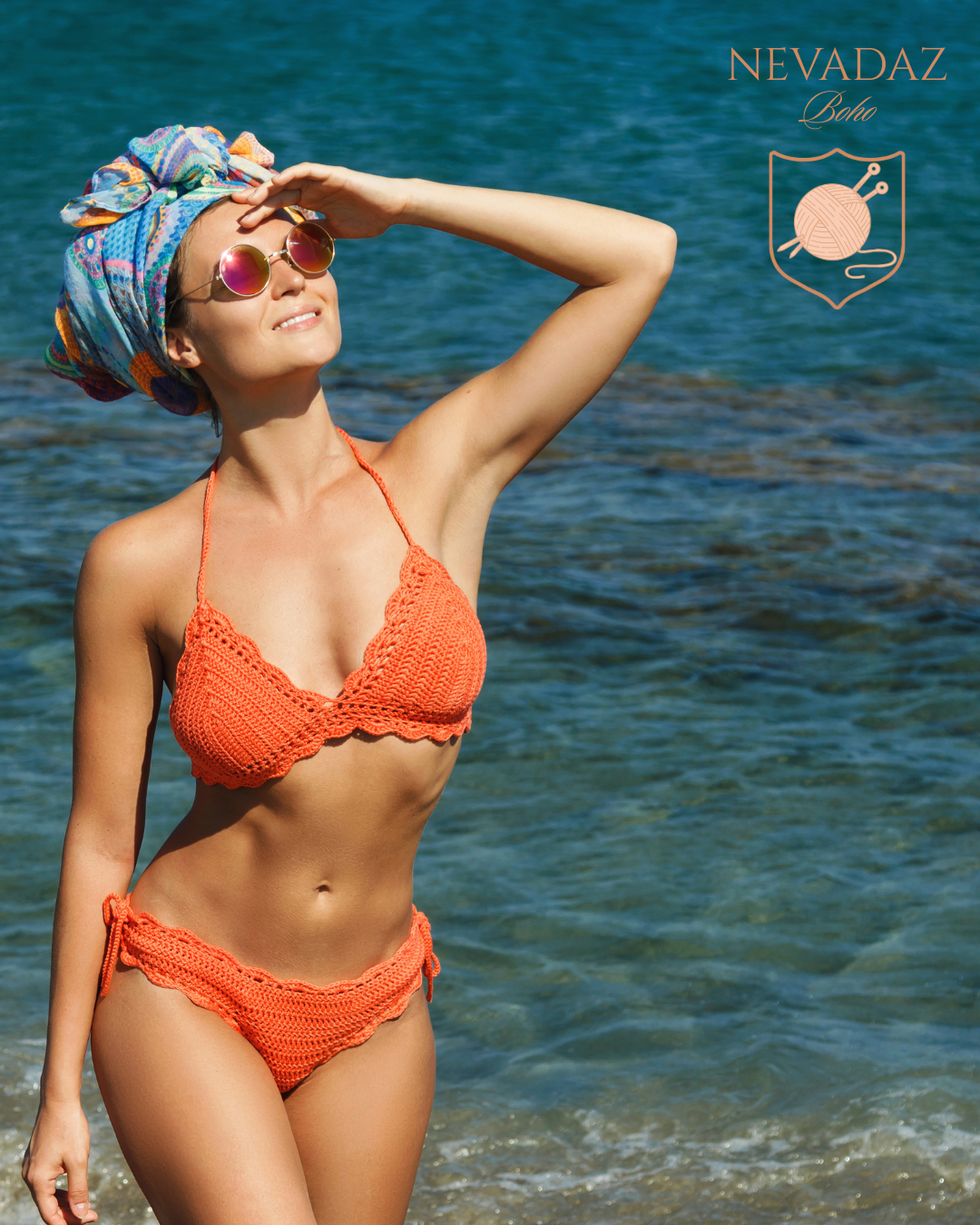 Woman in an orange bikini with a colorful headscarf on a beach, with 'Nevadaz' branding.